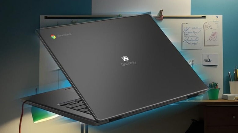 A Gateway laptop shown from the back in a generic office room