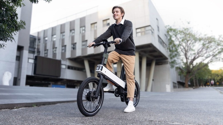 A person riding an Acer ebii bike, which was made with help from Xplova