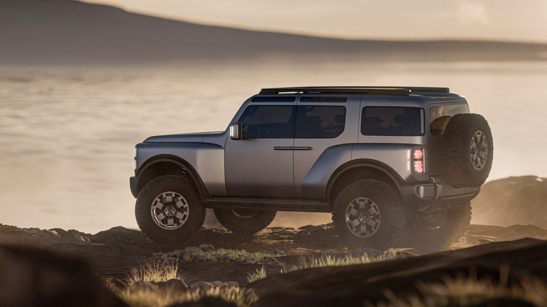 Side view of Hyundai Boulder SUV concept parked on top of mountain.