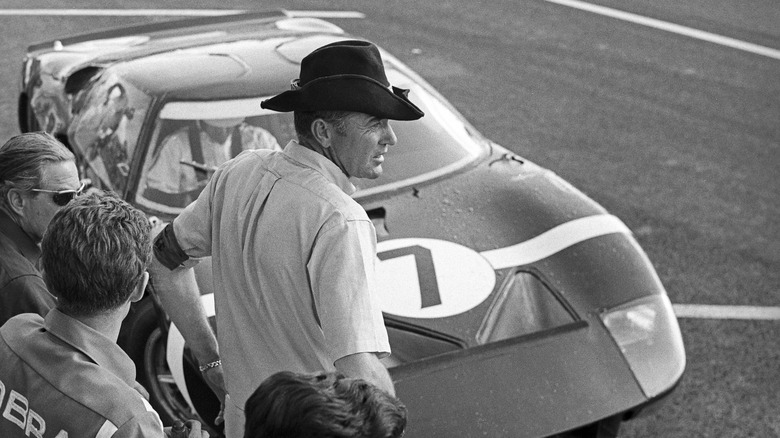 Carroll Shelby with his car