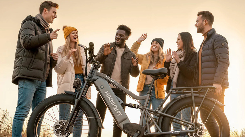 Smiling group of people standing next to HiKnight H6 pro e-bike