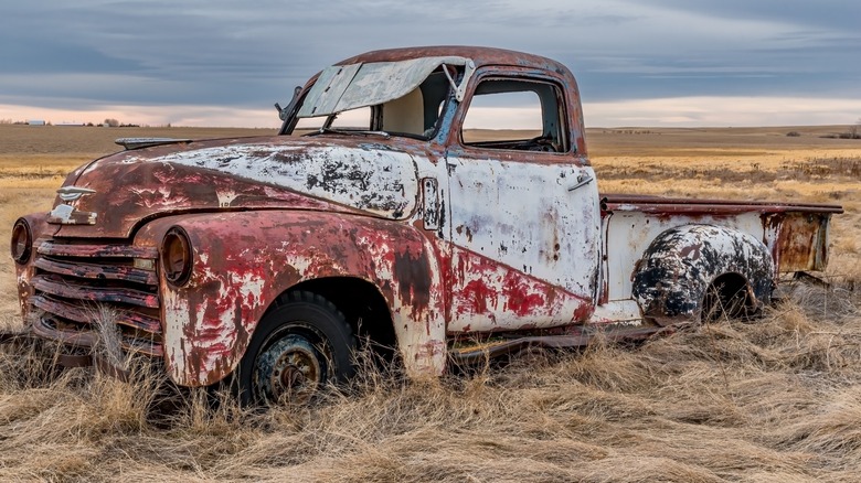 Rusty abandoned Chevrolet pickup truck