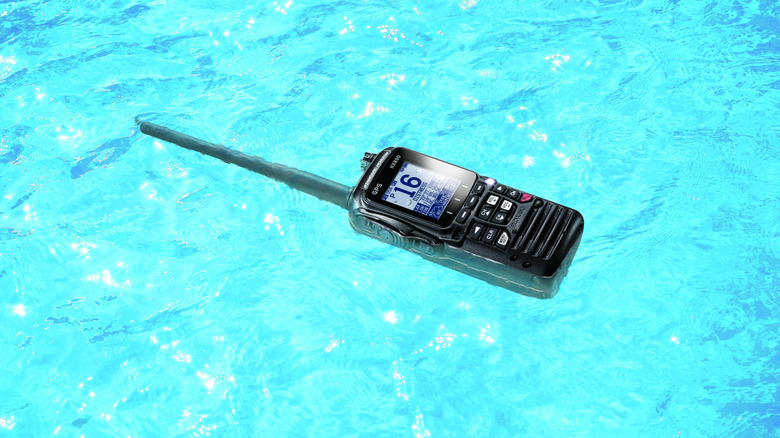The HX890 handheld VHF radio floating on water