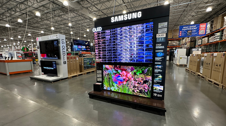 Costco electronics and consumer tech section with TVs on display