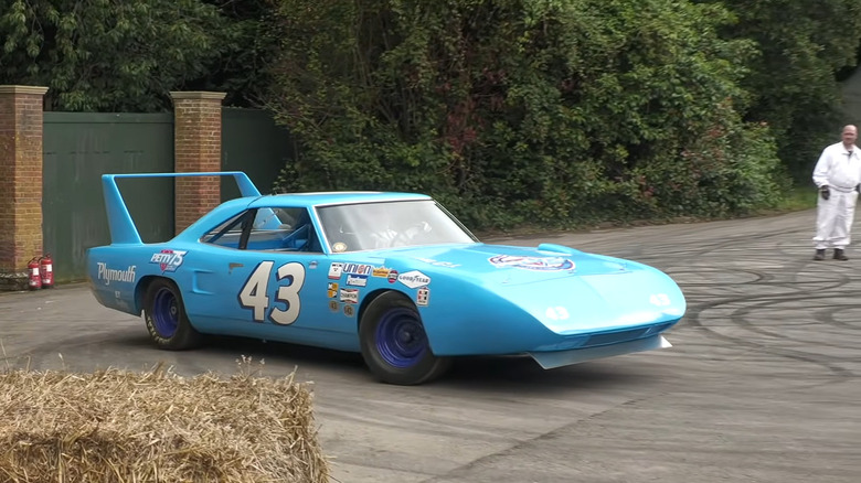 A blue Plymouth Superbird finished in blue, at the Goodwood Festival of Speed.