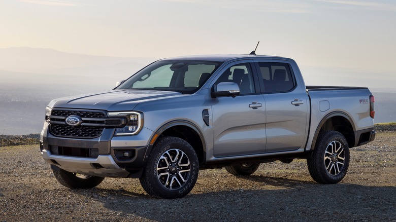 A silver 2025 Ford Ranger on an unpaved surface