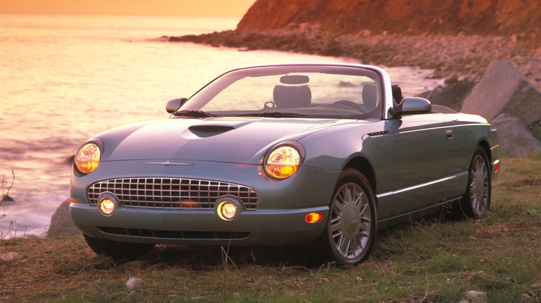 A 2002 Ford Thunderbird parked on a shore