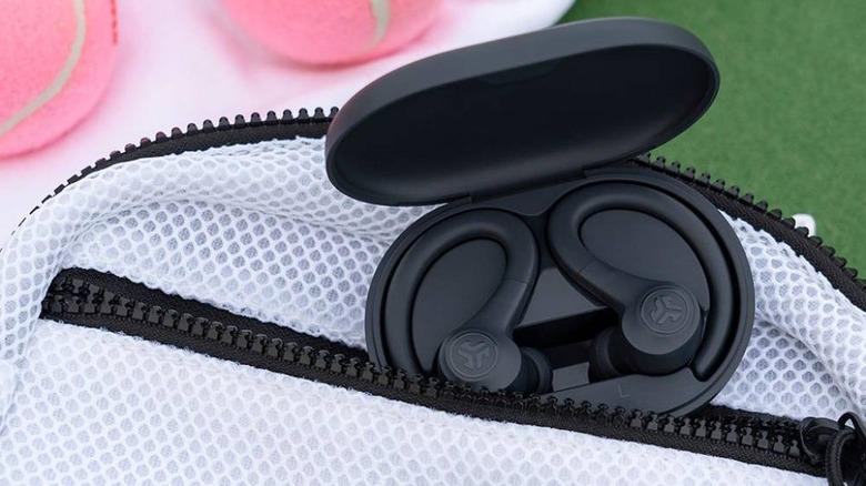 Close up of the JLab Go Sport+ next to a zippered pouch.