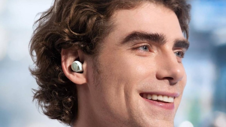 The Soundcore Space A40 in a man's ear.