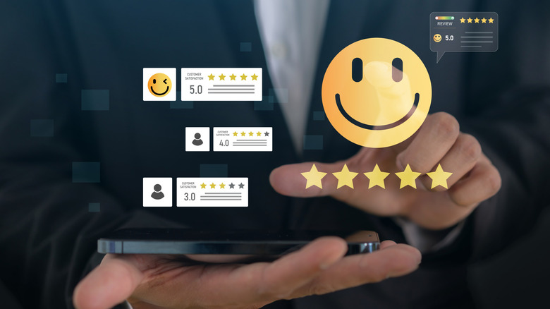 Holographic images of user ratings and happy emojis.