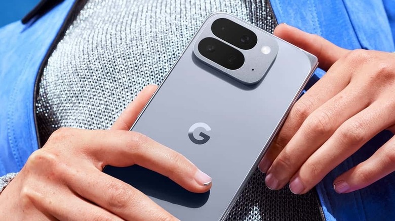 A person holding the Google Pixel 10 Pro