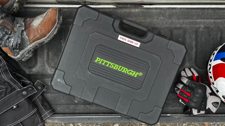 Pittsburgh tool case in truck bed with boot and gloves