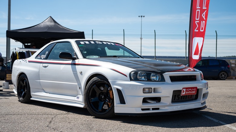 Nissan R34 Skyline GTR parked car show