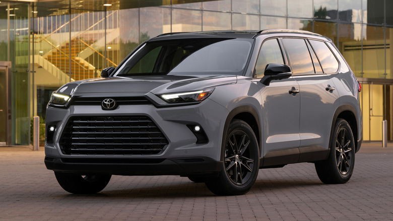 Toyota Grand Highlander near an office