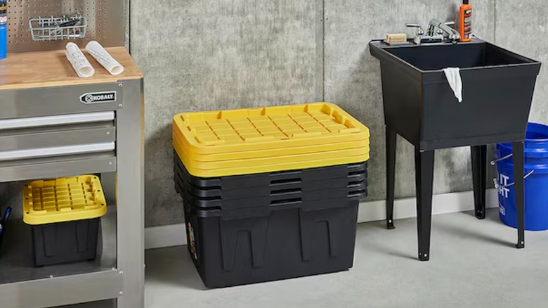 Project Source Commander 27-gallon Heavy-Duty Stackable Totes in a garage