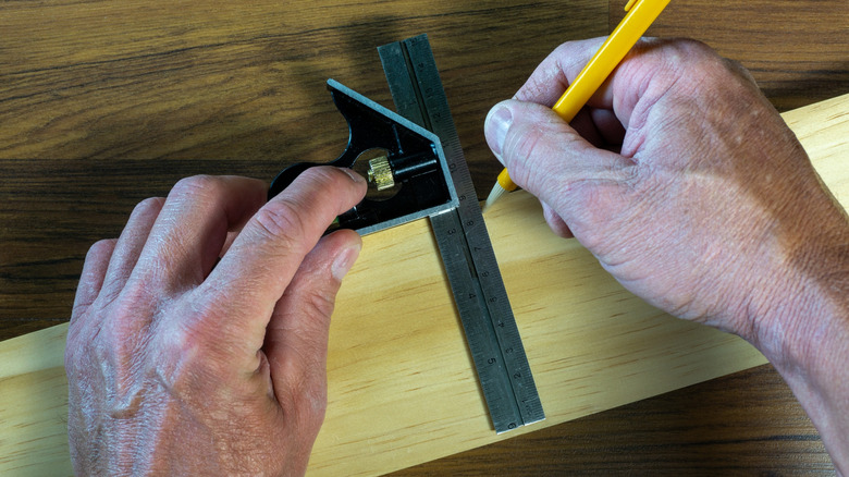 using a combination square to mark a board
