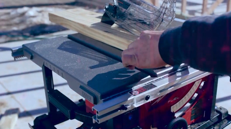Milwaukee M18 Fuel Table Saw being used outdoors at a jobsite
