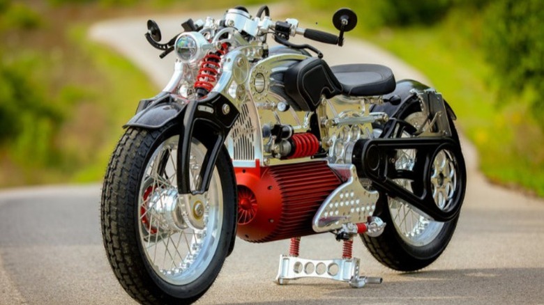 Red and black Curtiss Motorcycle on the road