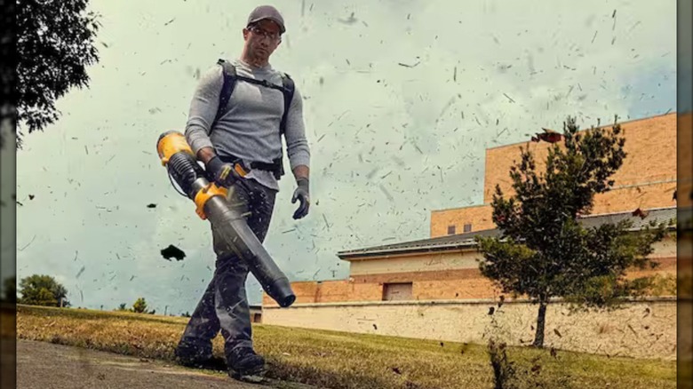 DeWalt 60V Max 160-mph, 855-cfm Cordless Backpack Blower in use