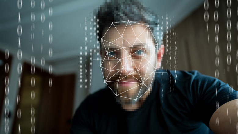 A person scanning their face