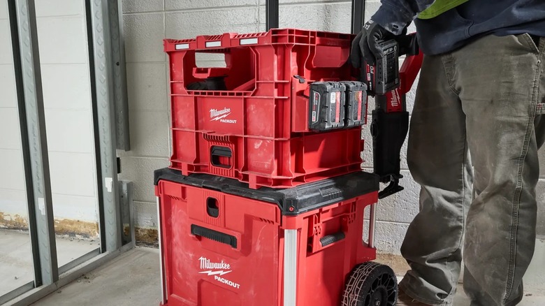 A person holding their Milwaukee Packout stack.