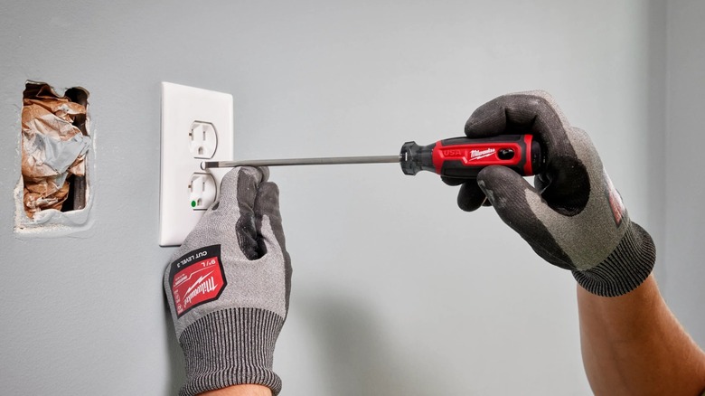 Milwaukee 10-inch Cushion Grip Screwdriver in use