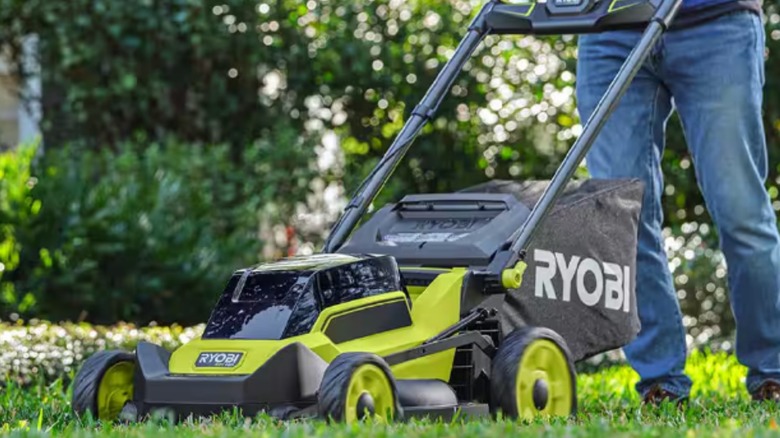 person using Ryobi 40v lawn mower