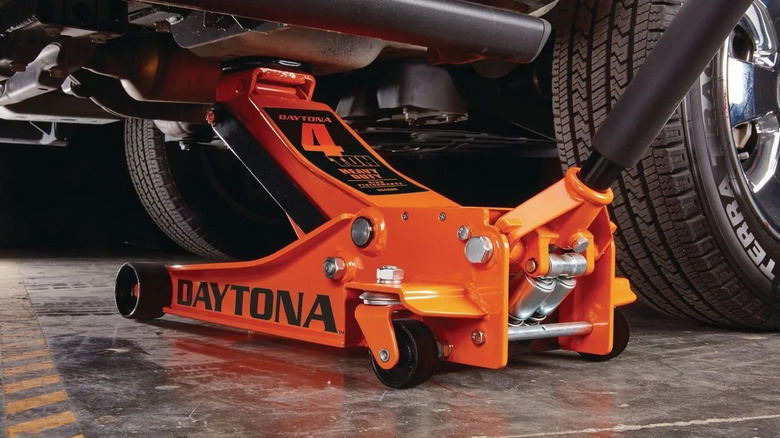 Daytona heavy duty floor jack under an SUV