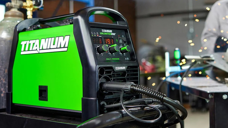 Titanium Unlimited 200 Multiprocess Welder on a tool cart