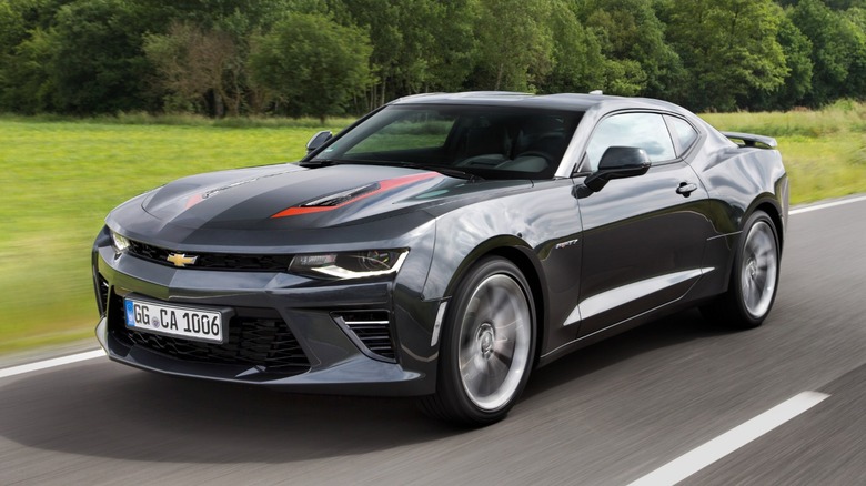A 6th-generation Chevrolet Camaro driving on a road
