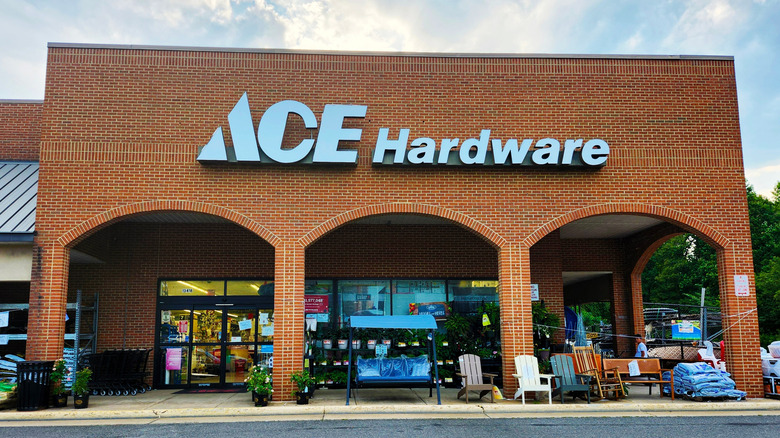 Storefront of an Ace Hardware with items set up out front