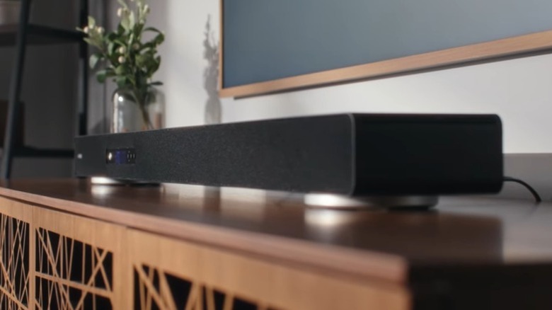 Yamaha True X Surround 90A soundbar on a wood cabinet