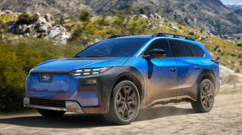 Front 3/4 view of 2026 Subaru Trailseeker on dusty desert trail
