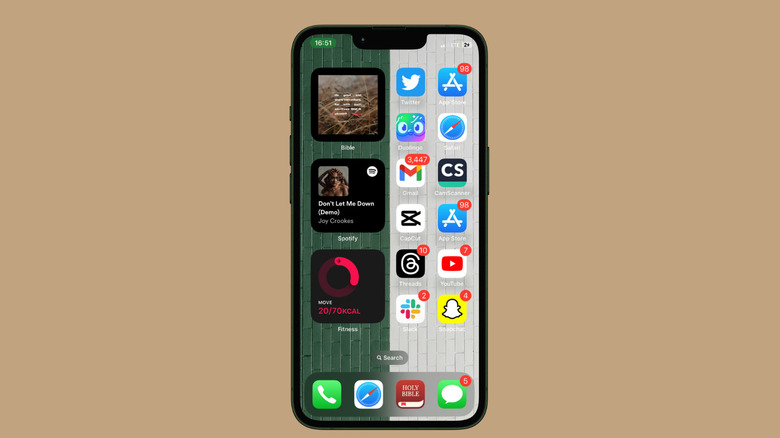 Screenshot showing iPhone home screen layout with split wallpaper