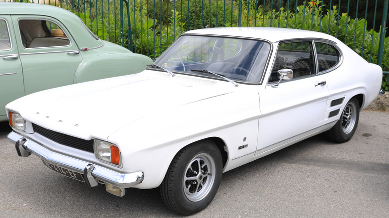 White Ford Capri in parking lot