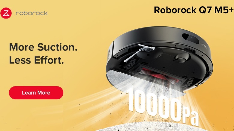 Roborock black Q7 M5+ robot vacuum on yellow background with text "More Suction. Less Effort"