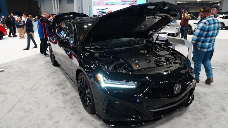 Acura TLX Type S at car show with engine showing