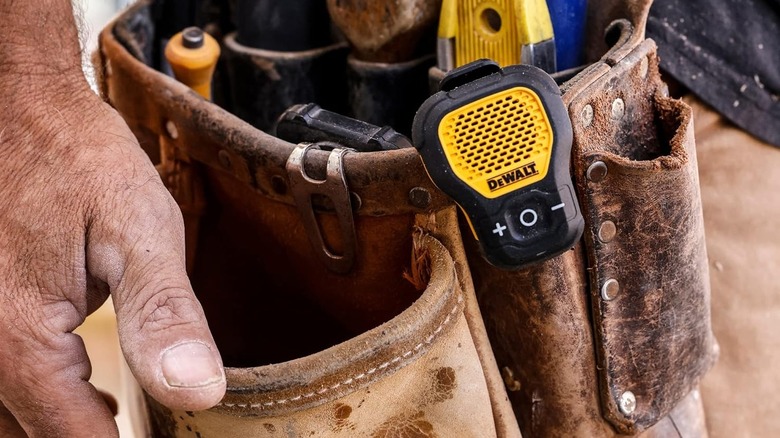 DeWalt portable speaker on tool belt