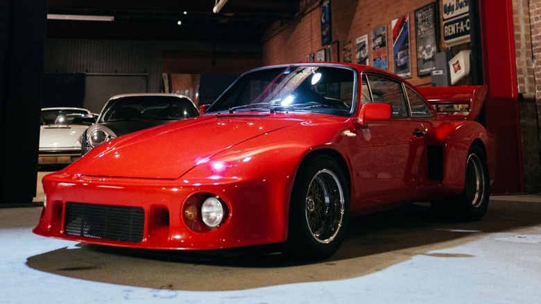 Red Porsche 911 Slantnose in a garage