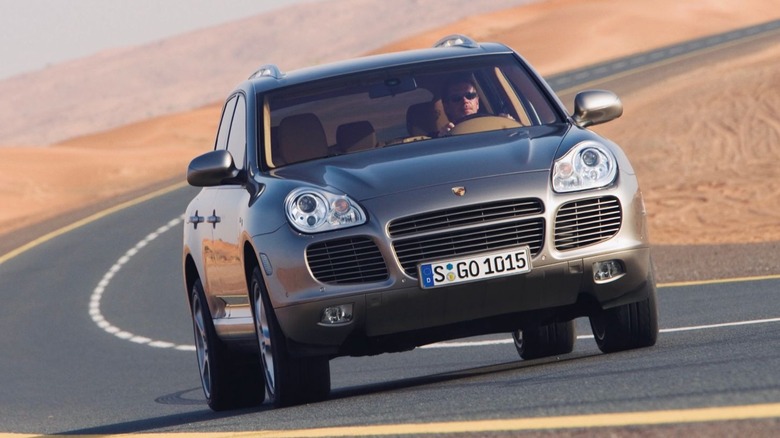 First-gen Porsche Cayenne Turbo driving through the desert