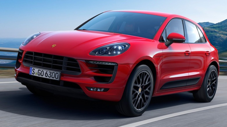 Red 2015 Porsche Macan front 3/4