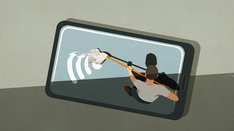 Cartoon man cleaning phone with mop