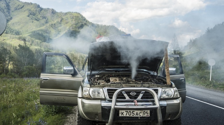 car with smoking engine