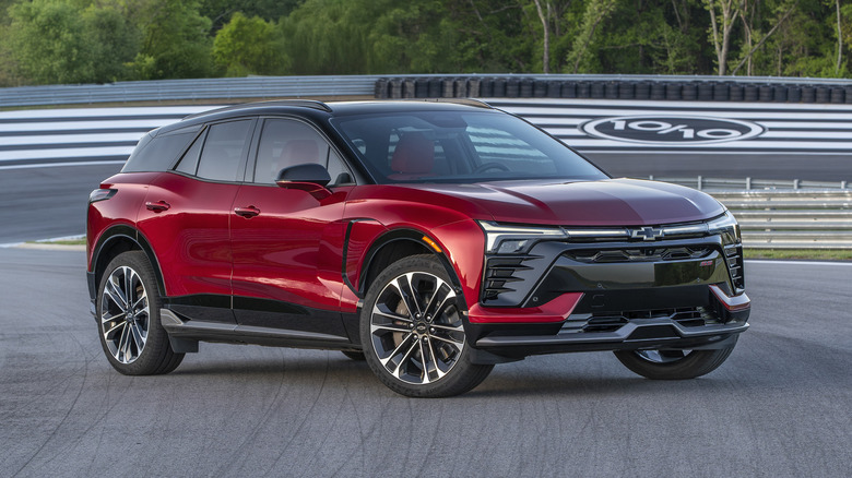 A red 2026 Chevrolet Blazer EV parked on a track