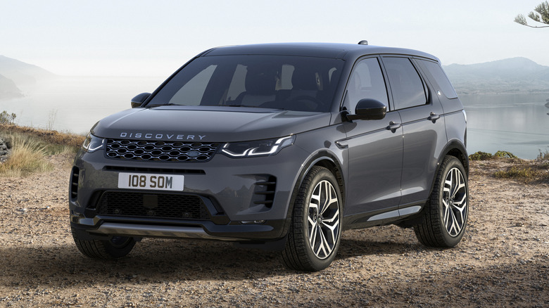 Gray 2026 Land Rover Discovery Sport parked by a lake