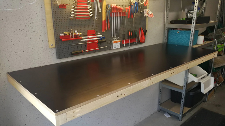 A bare fold-down workbench