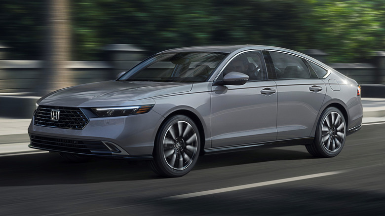 gray 2026 Honda Accord Touring driving down a street