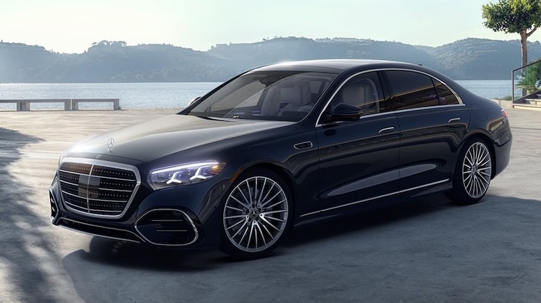 black 2027 Mercedes-Benz S 500 4Matic parked in front of a lake