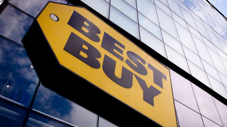 the Best Buy logo is seen on the facade of a building