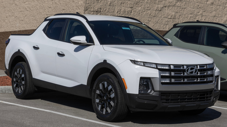 White Hyundai Santa Cruz parked in parking lot